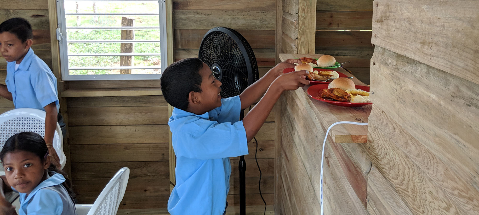 Boy Picking Up Food